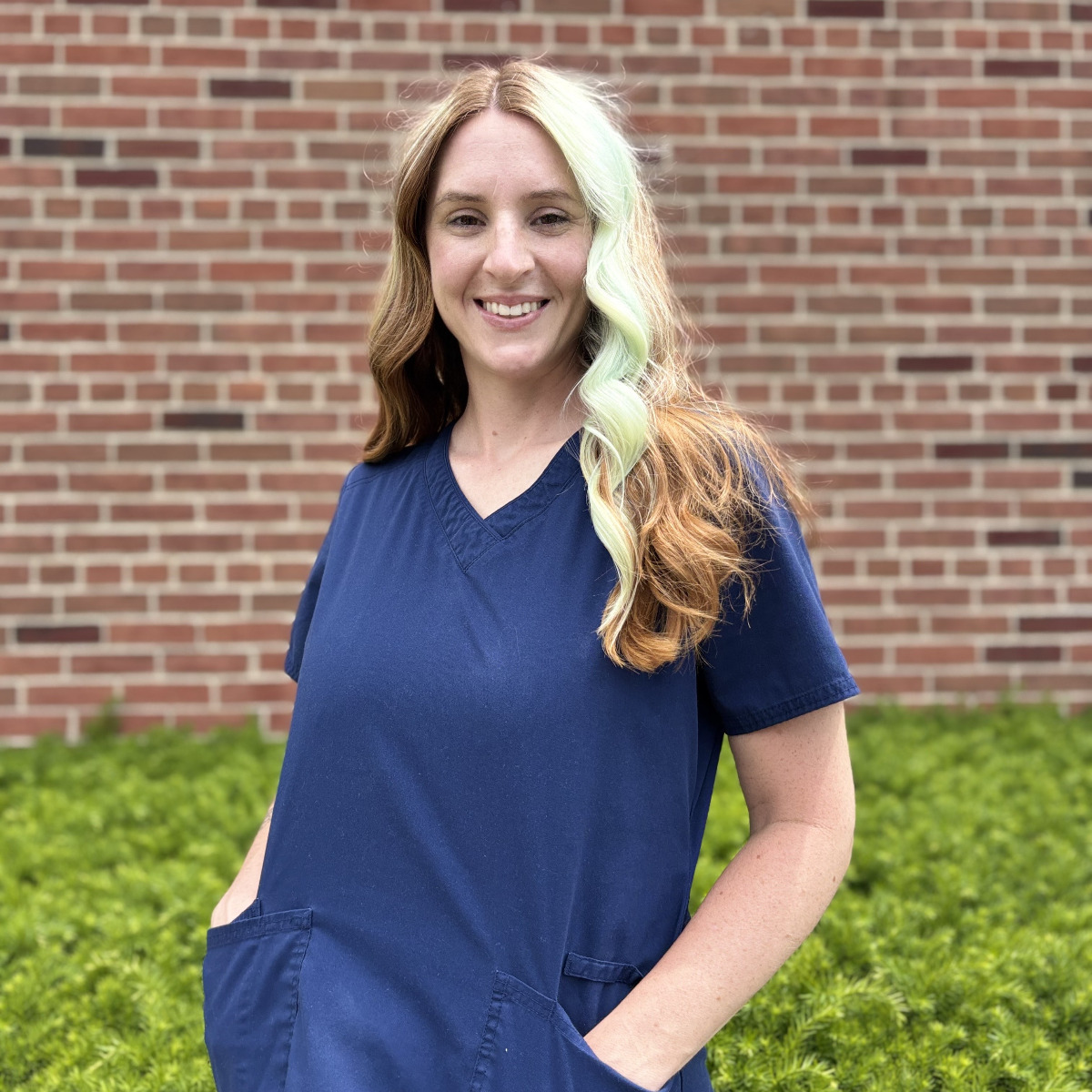 Nurse in dark blue scrubs
